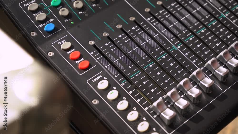 Poster close up of channel faders and auxiliaries button of sq-5 sound mixer. - high angle