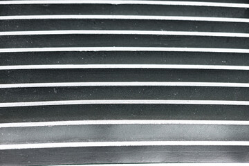 Gray textured metal urban wall for background