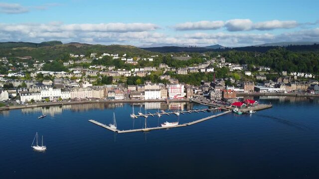 Oban Harbour Lake, Seaside Town on West Coast of Scotland, Aerial Drone 4K HD Footage Full View Rising up