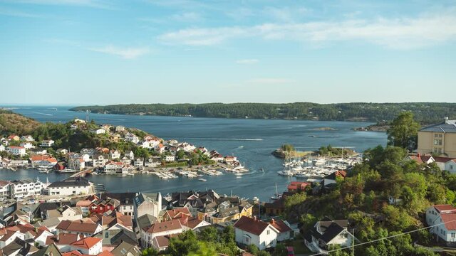 Time lapse in Kragero showing the boating activity along the marina; Norway