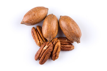 Few pecan nuts isolated on white