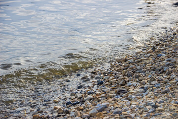 Waves run over the rocky shore