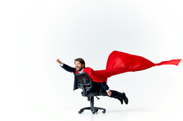 business man with red cloak in the chair hero superman
