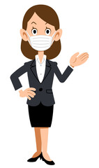 手のひらで案内するマスクを付けてスーツを着た女性
