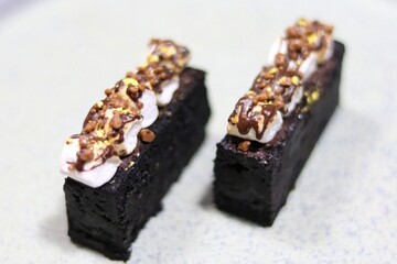 luxury hand made Micheline French modern Chocolate Ecstacy Bar dessert on white black background pastry sweet halal food menu cafe restaurant cake shop