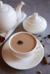 Traditional indian black tea. Masala tea. Spiced milk tea