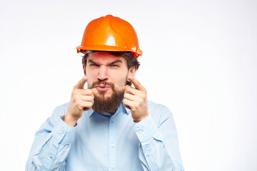 bearded man work in the construction industry protective uniform