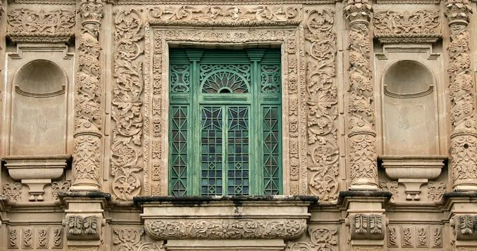 Ornate Facade Of Ancient Cathedral Of Cajamarca In Peru. tilt down