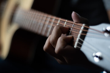 Fototapeta na wymiar D Chords on classical wooden guitar