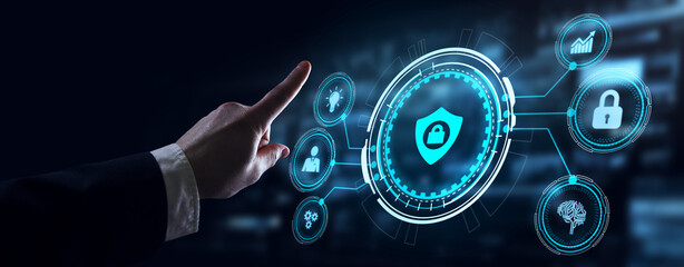 Fototapeta premium Cyber security data protection business technology privacy concept. Young businessman select the icon security on the virtual display.