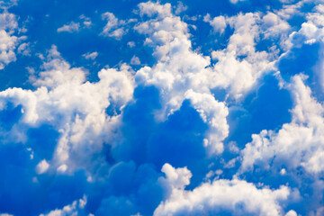 Obraz na płótnie Canvas View from airplane to clouds