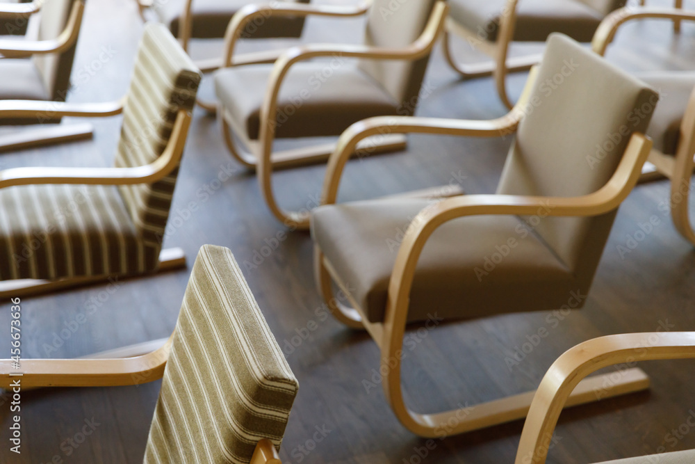 Poster chairs stand in rows in the hall