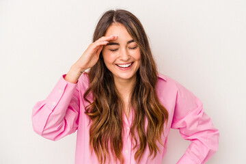 Young caucasian woman isolated on white background joyful laughing a lot. Happiness concept.