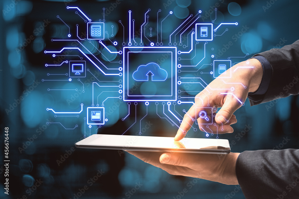 Aufkleber Close up of hand pointing at tablet with abstract glowing circuit cloud computing interface on blurry blue bokeh background. Information, technology and network concept.
