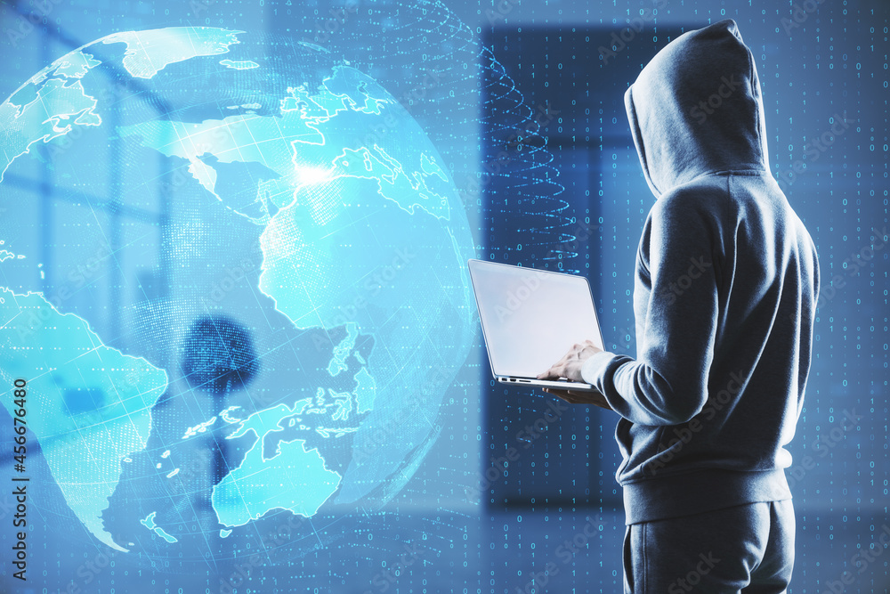 Poster Hacker in blurry office interior using laptop with creative glowing globe interface on dark background. Technology, network, hacking, theft and online data concept.