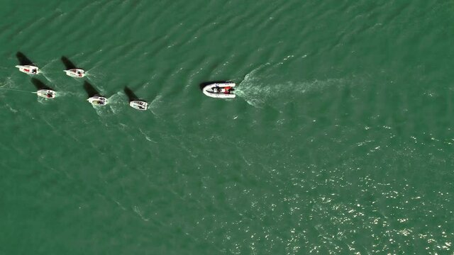 An aerial view of optimist boats for children in 4K
