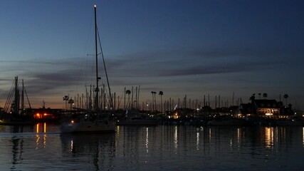 Luxury yachts sailboats floating, marina harbour quay. Sail boat masts, nautical vessels in port....