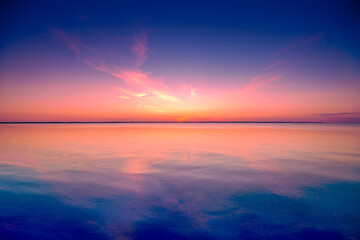 Obraz na płótnie Canvas Seascape in the early morning. Sunrise over the sea. Nature landscape