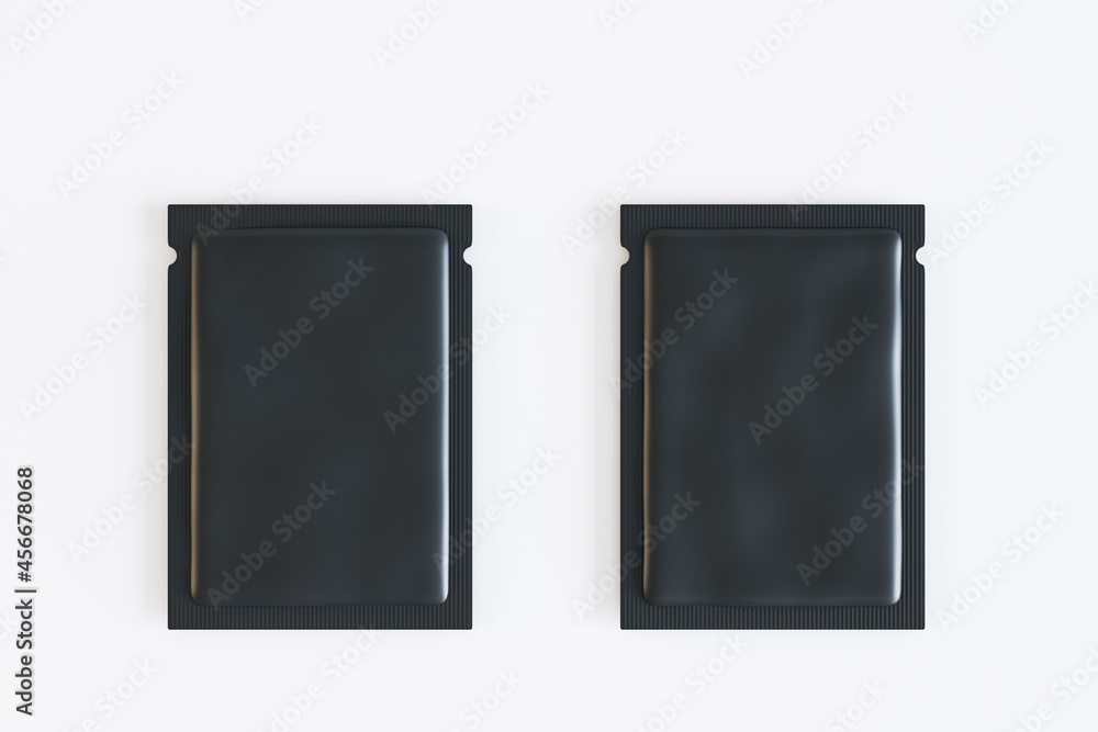 Aufkleber Empty two black product packets on white background. Mock up, 3D Rendering.