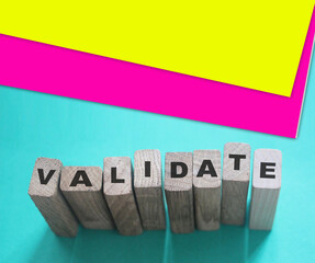 Validate word on Wooden Blocks. Business evaluation concept