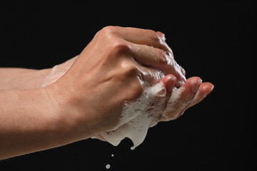 Washing your hand by alcohol sanitizer gel for protecting infection from a Covid-19 virus and other viruses.