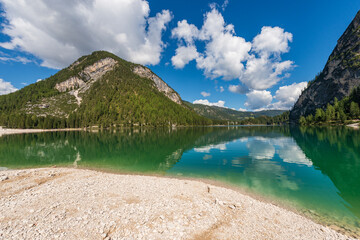 Lago di Braies or Pragser Wildsee, small alpine beautiful lake in Braies valley, Dolomites, UNESCO...