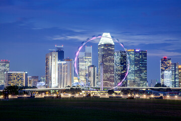 SSINGAPORE, SINGAPORE - MARCH 2019: Vibrant Singapore skyline at night