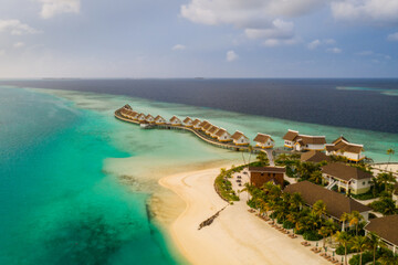 Amazing bird eyes view in Maldives island Eh'mafushi crossroads maldives at sunrise. Aerial drone shot. Saii lagoon and hard rock hotel. July 2021