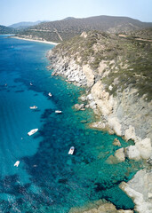 Aerial view of turquoise sea in the little bay in the city of Cagliari (Cala Barca) travel destination.