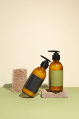 Amber glass dispenser bottle, sprayer and moisturizer cream jar. Natural cosmetic products...