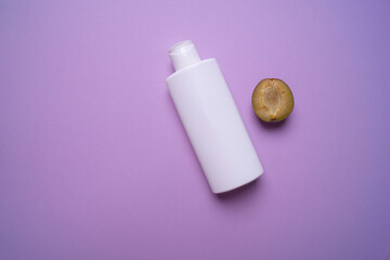 packaging of shampoo or hair rinse on a colored background