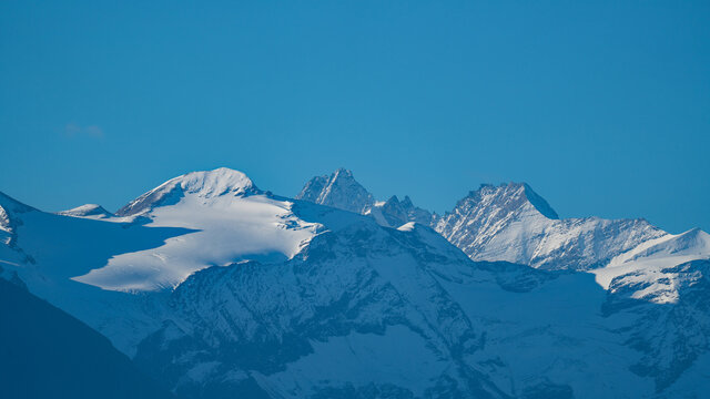 wonderful view of the hohen tauern with the gross glockner in austria, salzburg at a sunny morning with clear blue sky