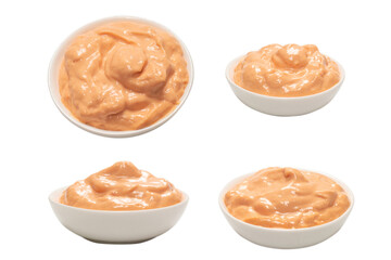 Sauce in a bowl isolated on white.
