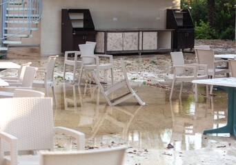 Thatched chairs in a cafe after  tornado.