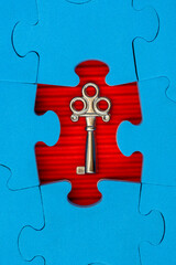 Jigsaw puzzle with small metal key