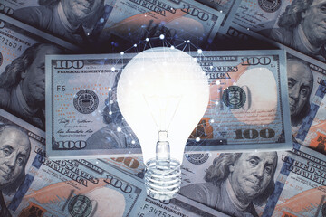 Double exposure of light bulb drawing over usa dollars bill background. Concept of idea.