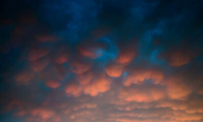 amazing cloudscape of stormy weather with dramatic mammatus clouds