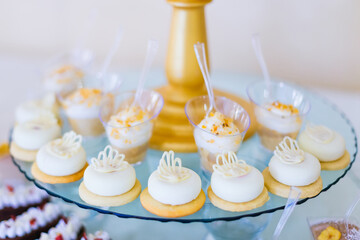 Puff pastries with buttercream isolated on a slate tray served at a pastry shop in a buffet
