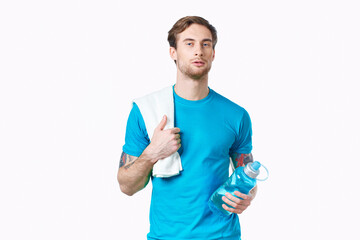 man in blue t-shirt water bottle health fitness