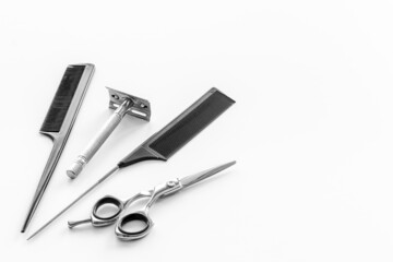 Set of barber shop equipment with hairdressing scissors and combs