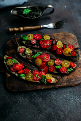 Baked eggplant appetizer with tomatoes and cheese