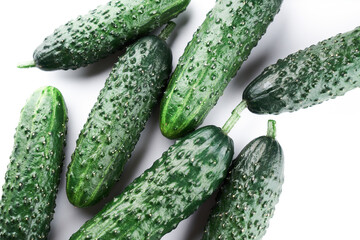 Set of fresh whole cucumbers on white background, food pattern. Garden cucumber wallpaper backdrop design