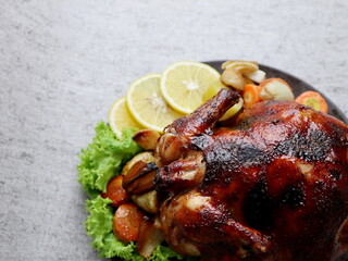 delicious roasted honey chicken with healthy vegetable garnish