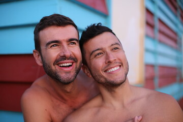 Beautiful gay couple at the beach