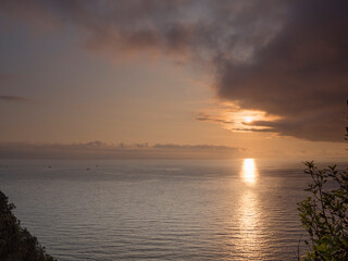 sunrise time lapse in front of a paradisiacal beach with beautiful cloudy sky