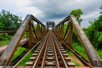 Fototapeta na wymiar Old Metal rail way road bridge.