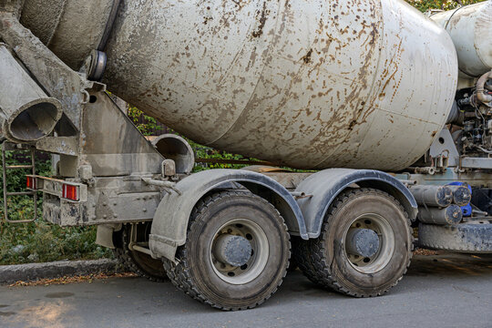 A fragment of a parked concrete truck in close-up