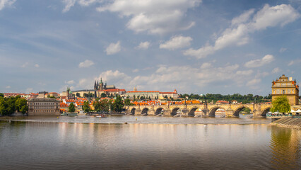 Obraz premium waterfront view across the river Vltava to Prague Castle and Charles Bridge, Prague, Czech republic