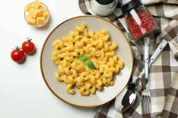 Concept of tasty eating with macaroni with cheese on white background