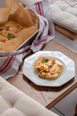 Homemade quark or curd casserole with mushrooms, red bell pepper and cheese. Healthy food, vegetarian protein-rich meal